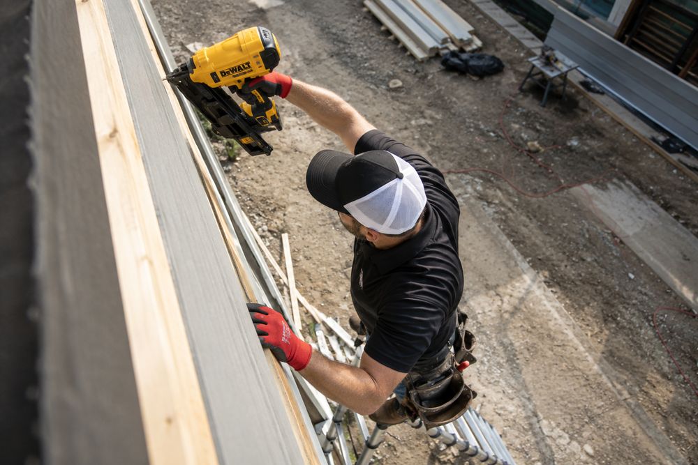 Domex crew installing James Hardie siding on site